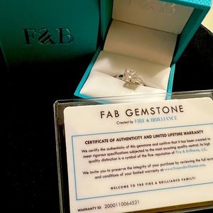 2 carat cushion cut Mossianite solitaire.